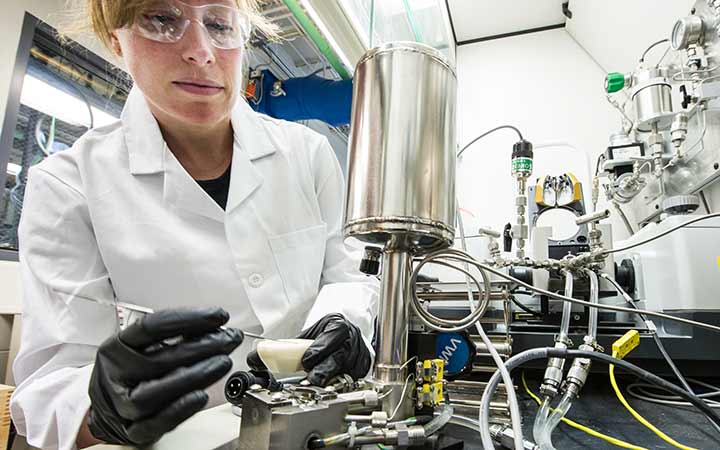 research-areas-38755 A researcher preparing reactions in a high throughput Parr chromatography system.